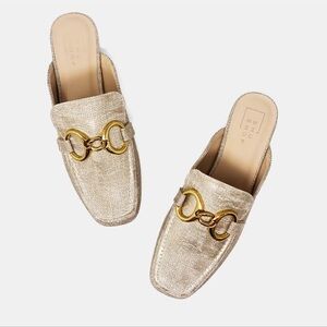 New in box. Andromeda gold slip on loafer. Multiple sizes.